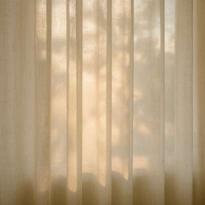 Sunlight through sheer curtains